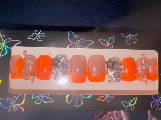 3D Orange Press-Ons With Junked Nail